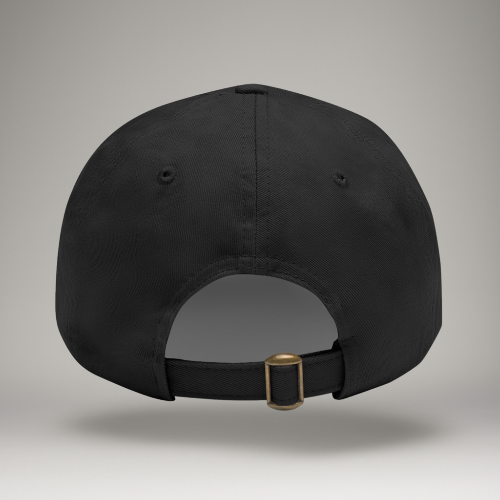 Black cap with a gold buckle on a gray background