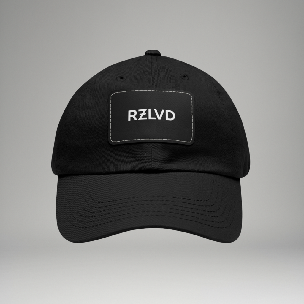 Black cap with 'RZLVD' logo on a gray background