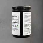 Supplement container with label on a gray background