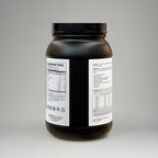 Black supplement container with label on a gray background